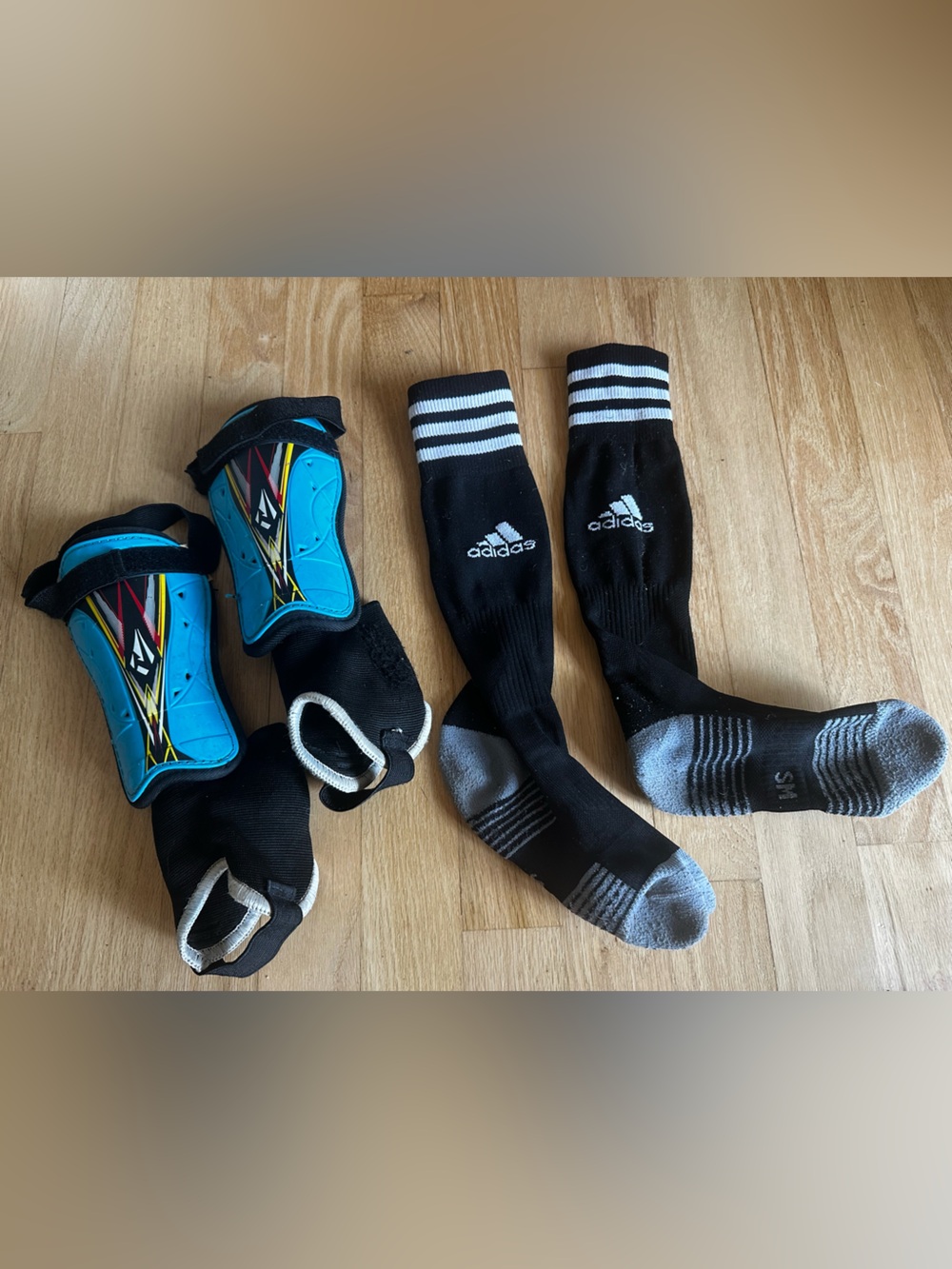Used Rawxy Blue soccer Shin Guards and adidas youth soccer socks Sz s age 6/7